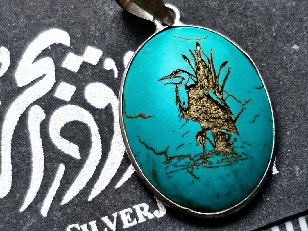 Golden Heron On Lake Bushes Engraved On A Turquoise Necklace