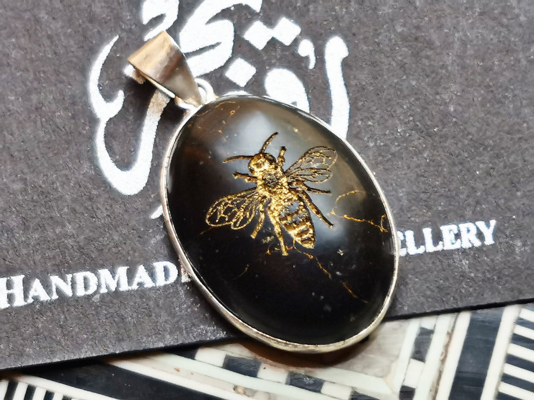 Golden Bee Engraved On Black Lapis
