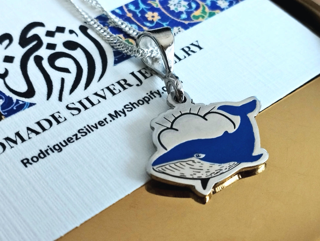 Flying whale necklace