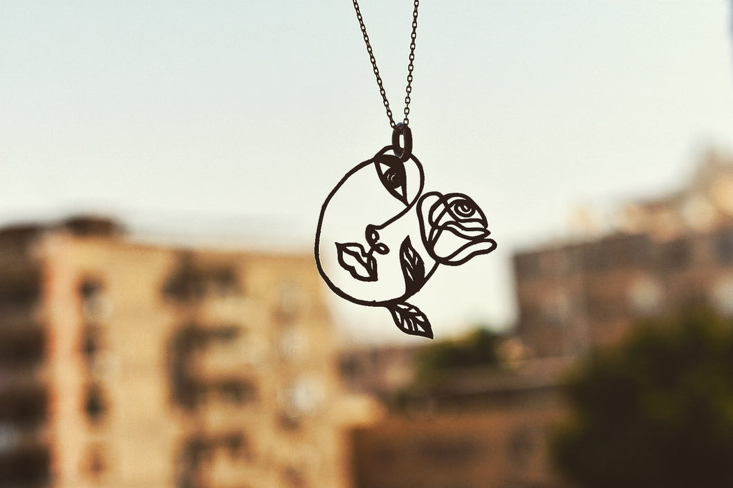 Outlined Abstract Face Necklace